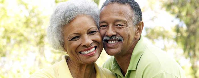 Happy elder couple with bright smile